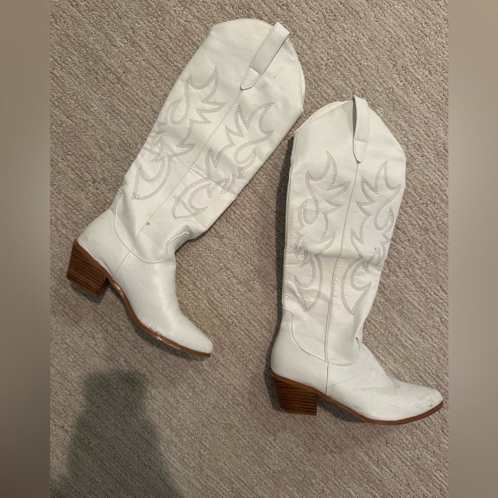 Tall white cowboy boots